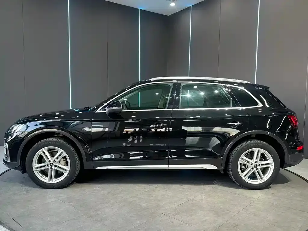 Audi Q5L — фото 9