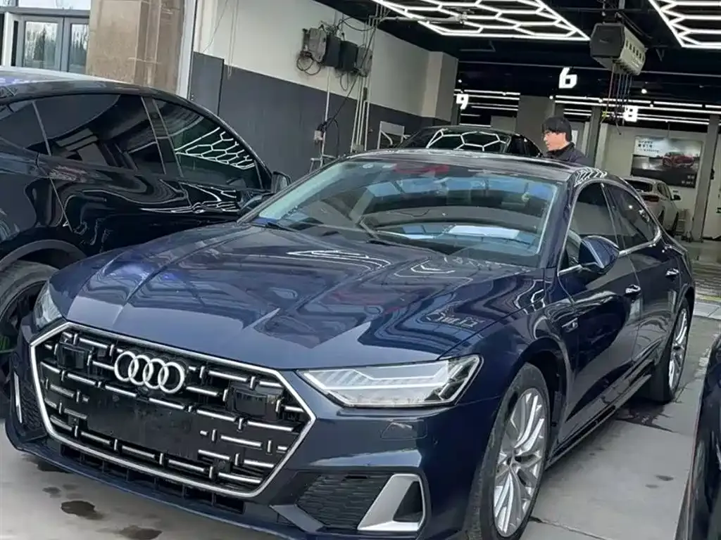 Audi A7L — фото 8