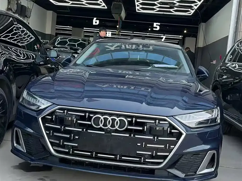 Audi A7L — фото 10