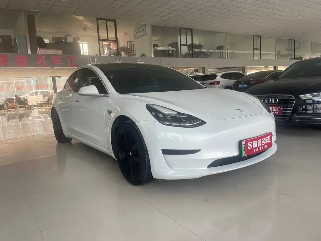 Tesla Model 3 — фото 5
