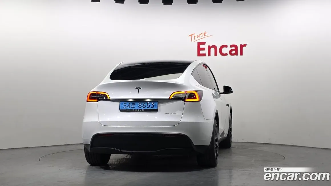 Tesla Model Y — фото 8
