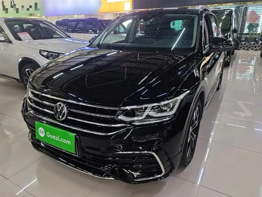 Volkswagen Tiguan L — фото 1