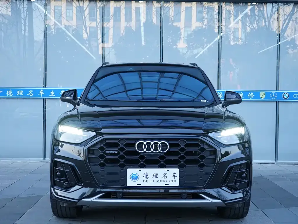 Audi Q5L — фото 5