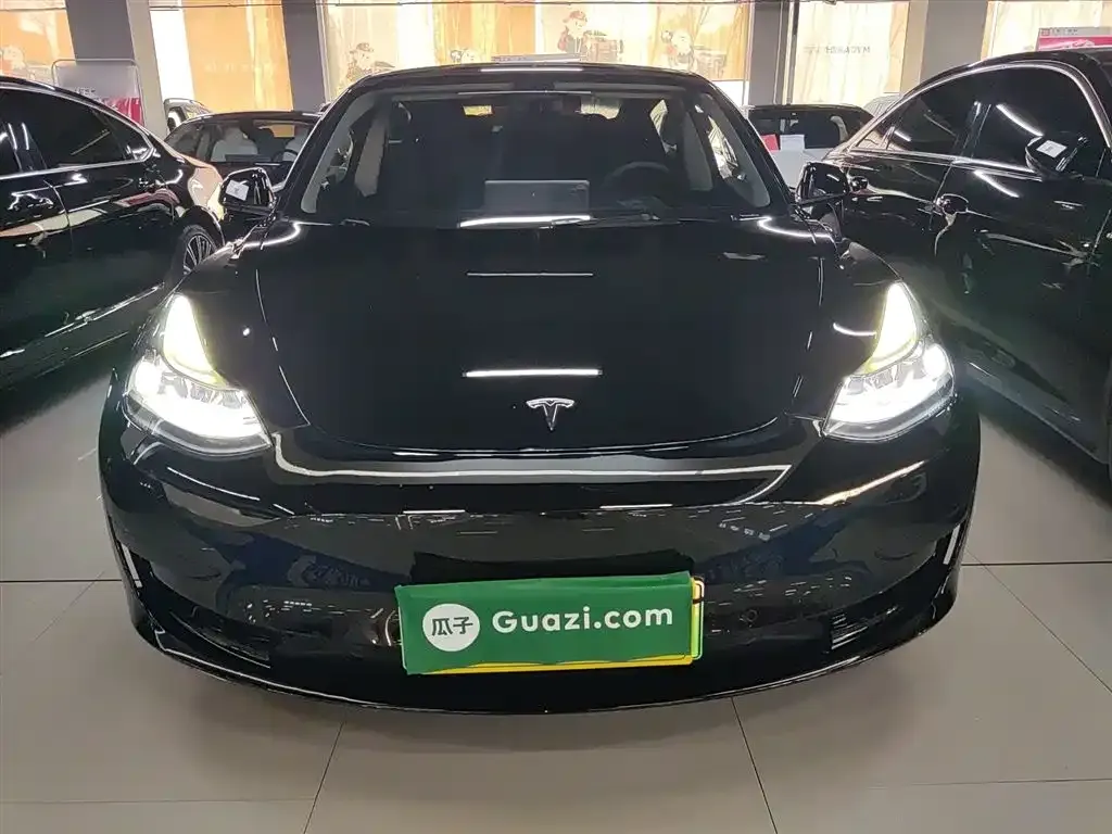 Tesla Model 3 — фото 7