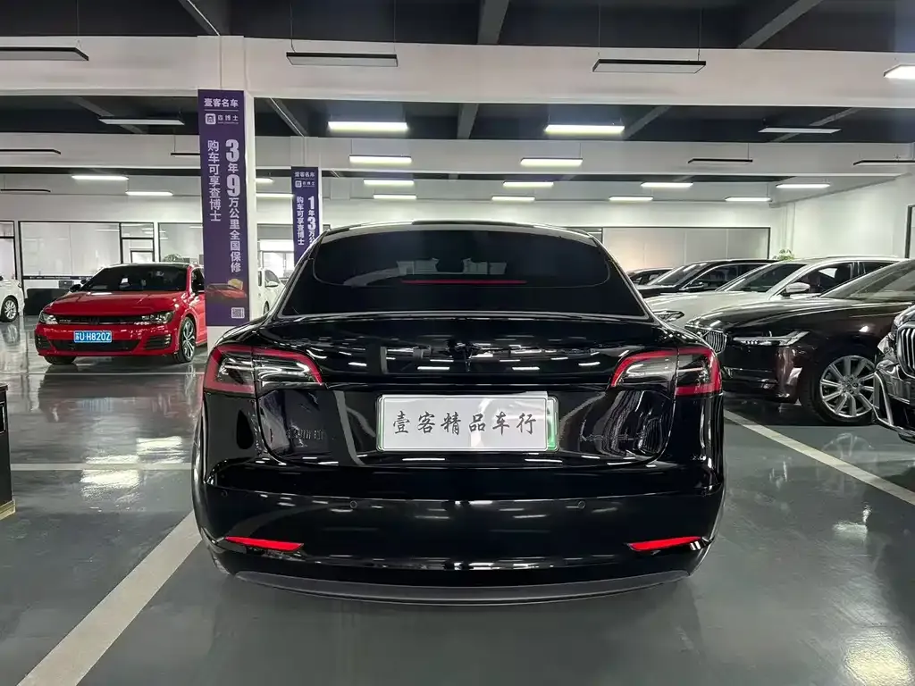 Tesla Model 3 — фото 10