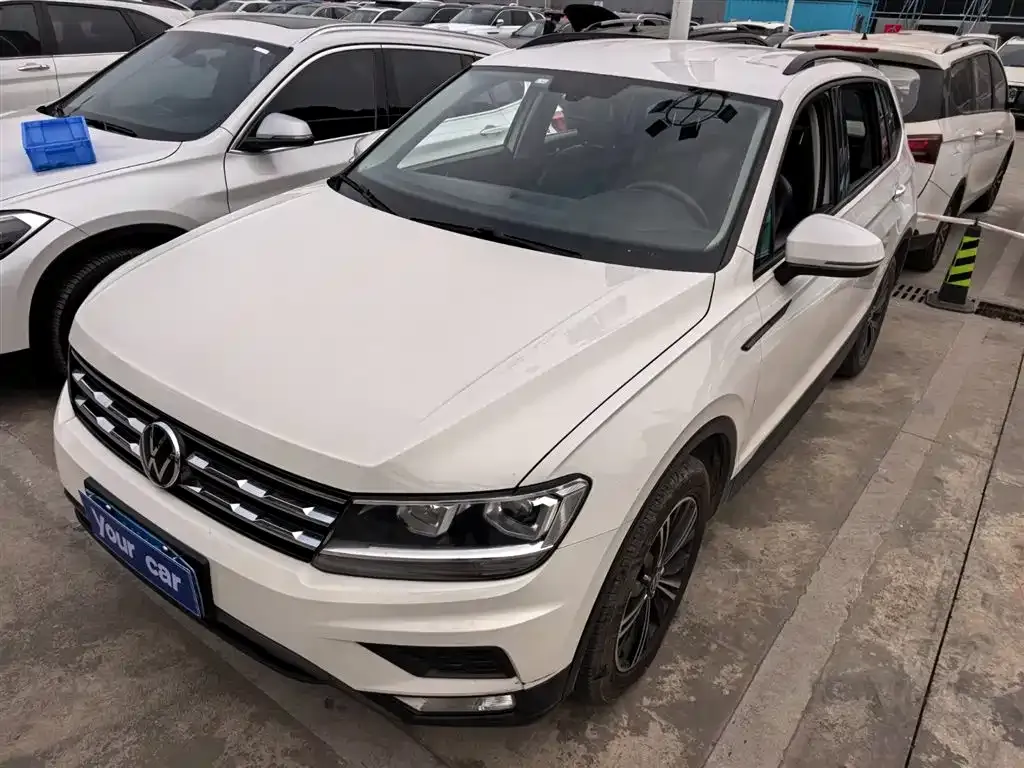 Volkswagen Tiguan L — фото 1