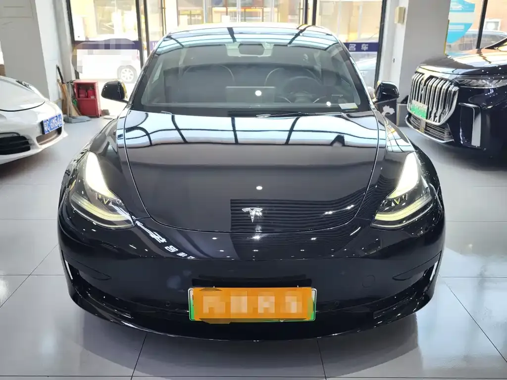 Tesla Model 3 — фото 10