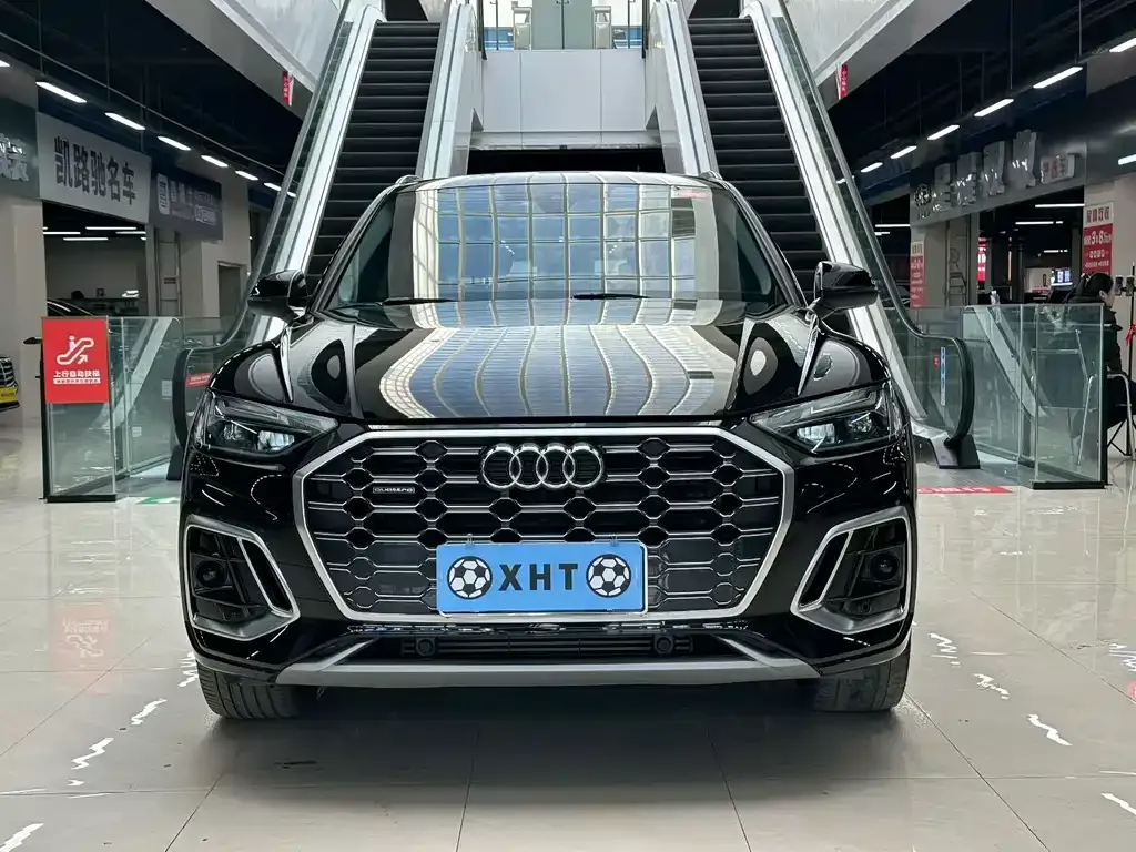 Audi Q5L — фото 5