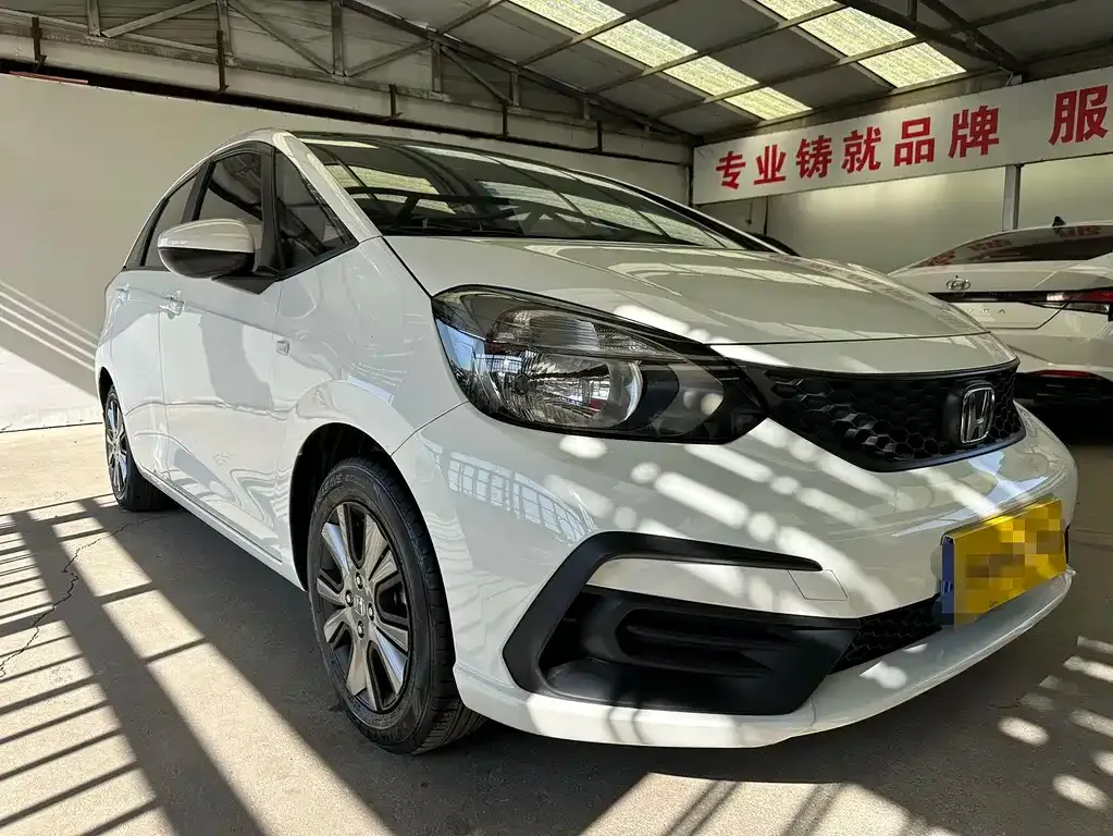 Honda Fit — фото 10