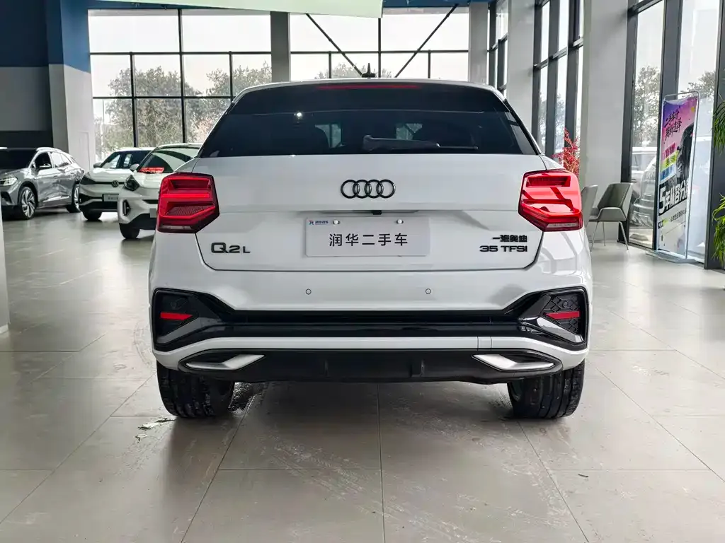 Audi Q2L — фото 3