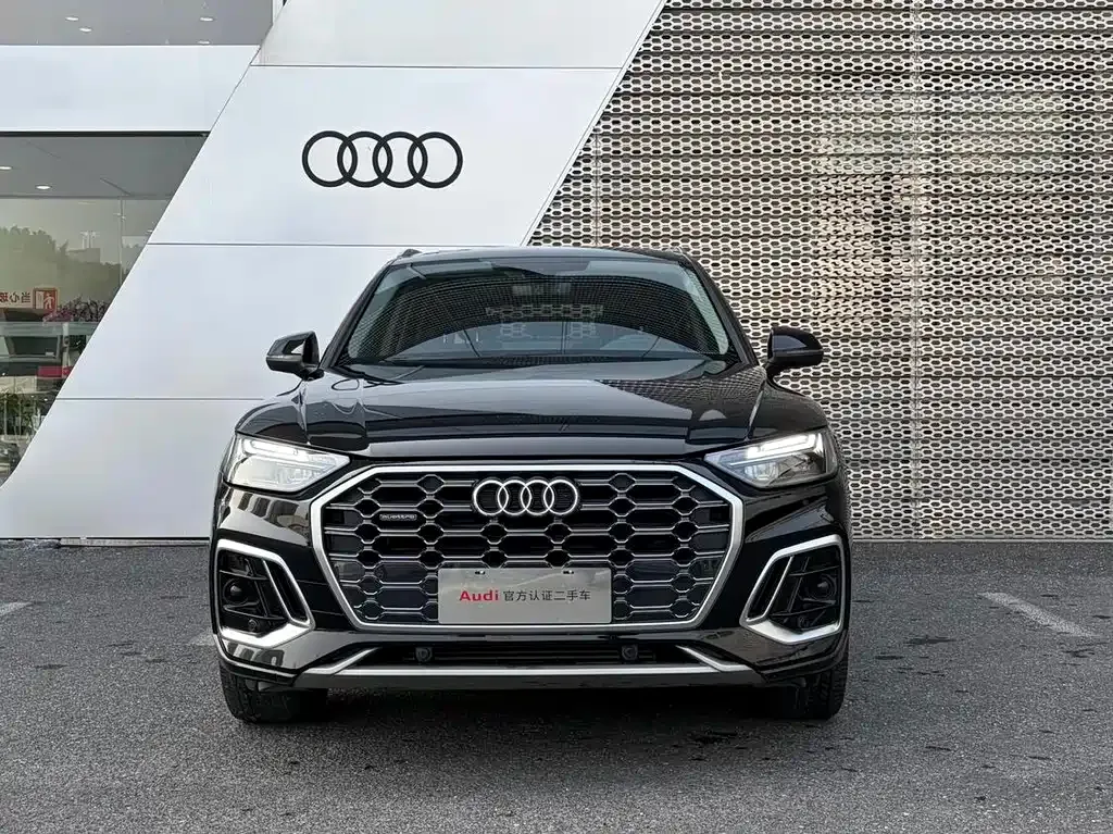 Audi Q5L — фото 10