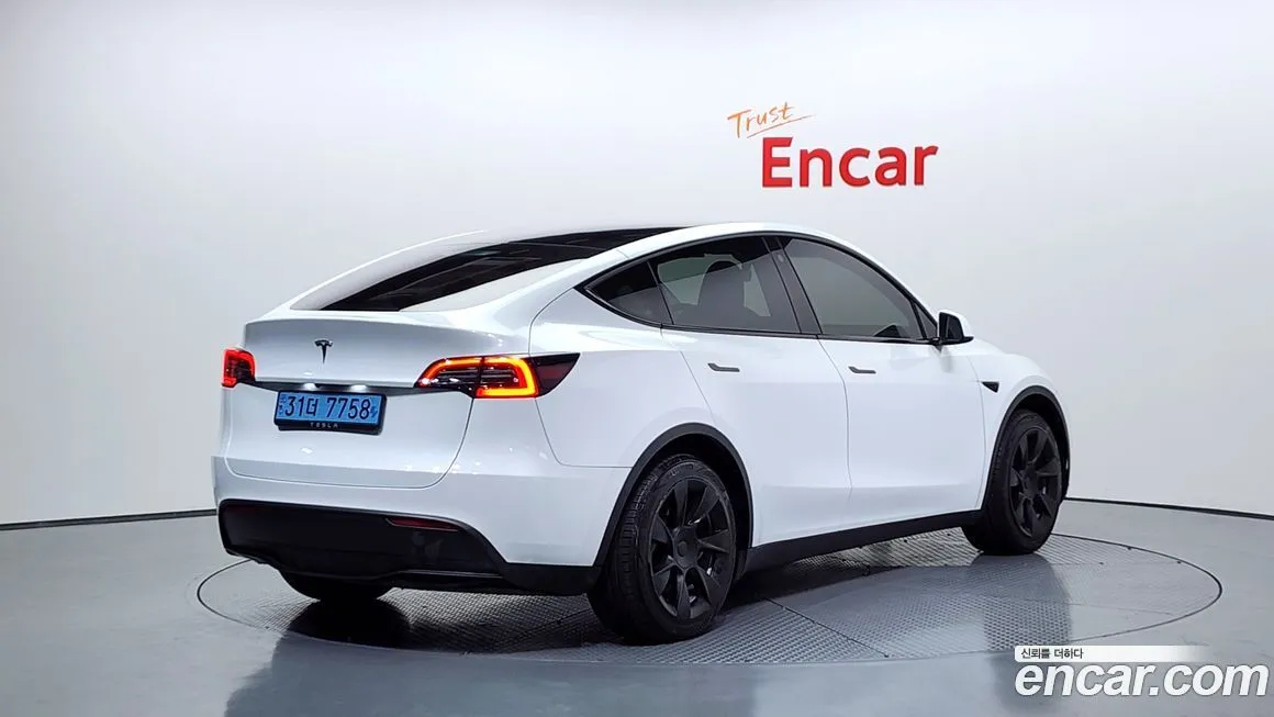 Tesla Model Y — фото 2