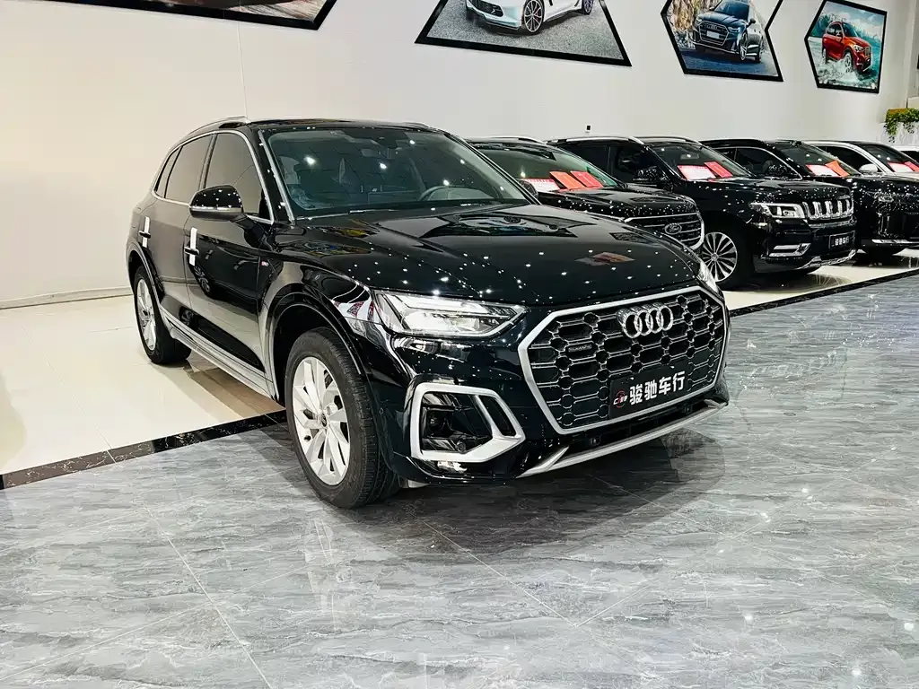Audi Q5L — фото 5