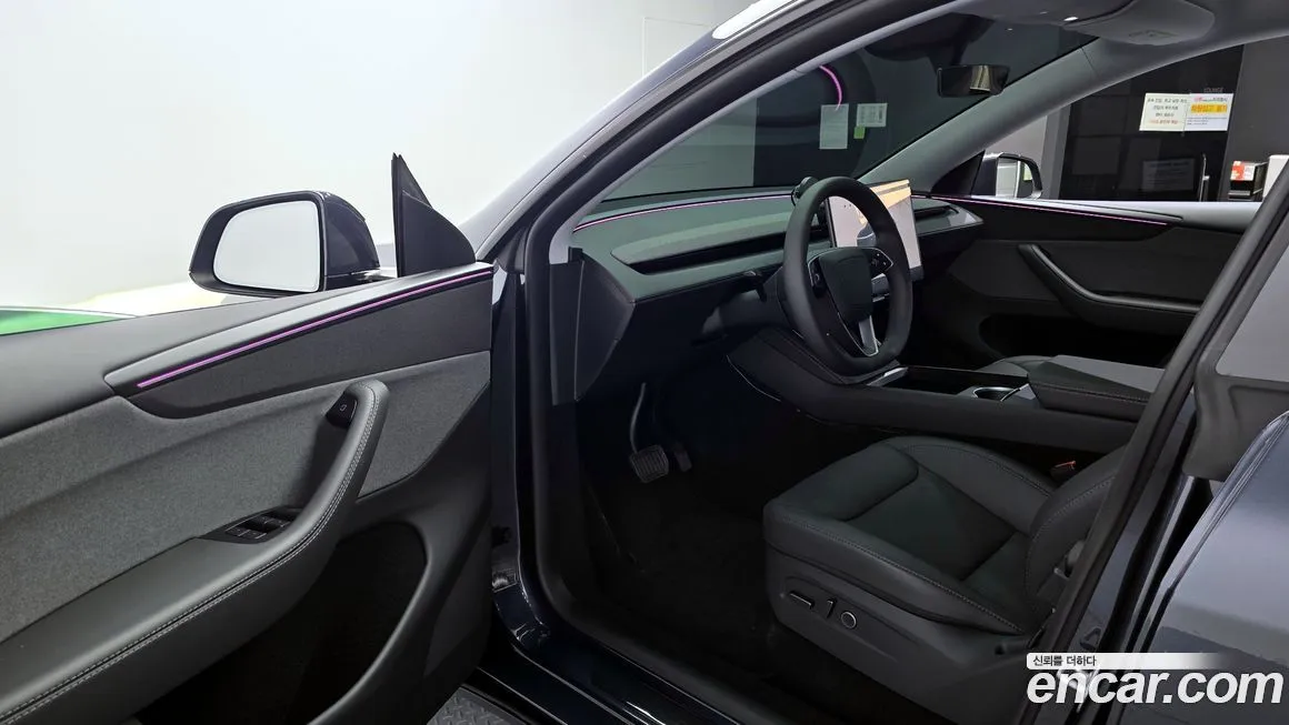 Tesla Model Y — фото 10