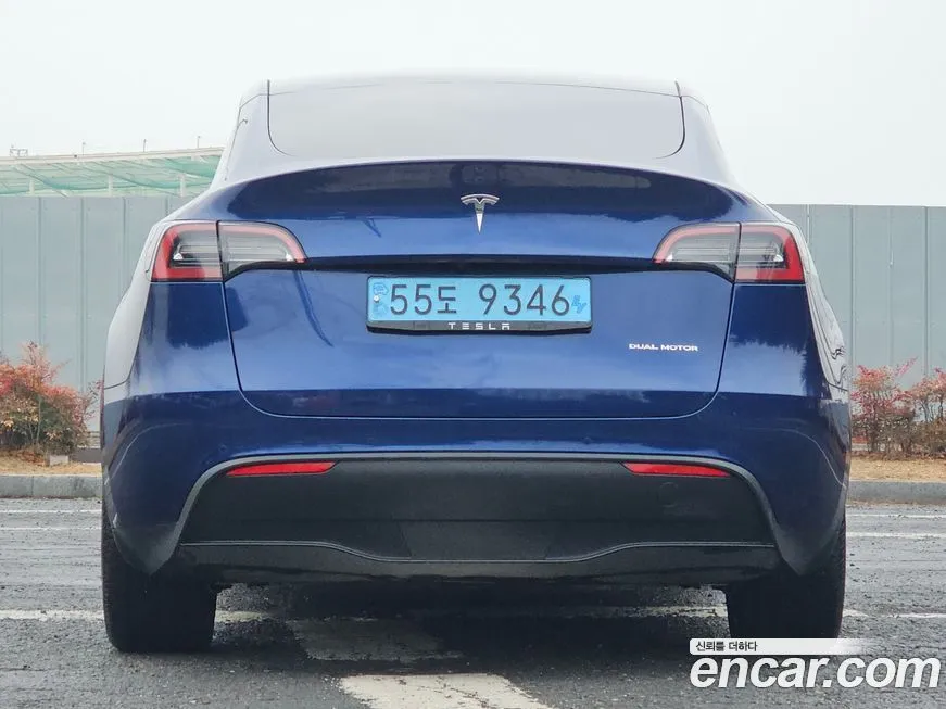 Tesla Model Y — фото 10