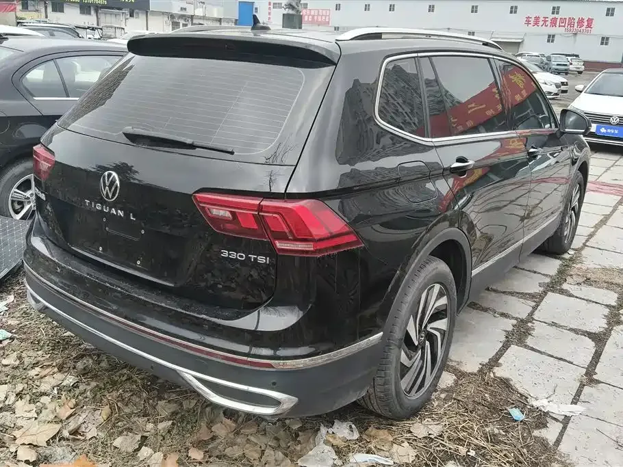 Volkswagen Tiguan L — фото 3