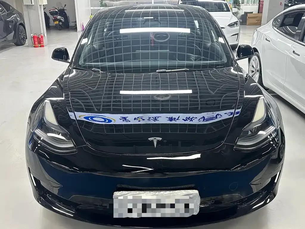 Tesla Model 3 — фото 10