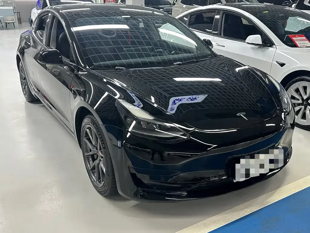 Tesla Model 3 — фото 9