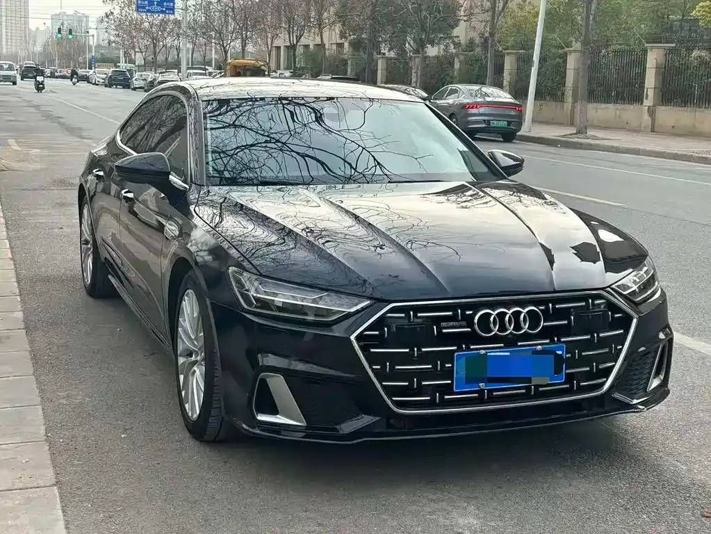 Audi A7L — фото 8