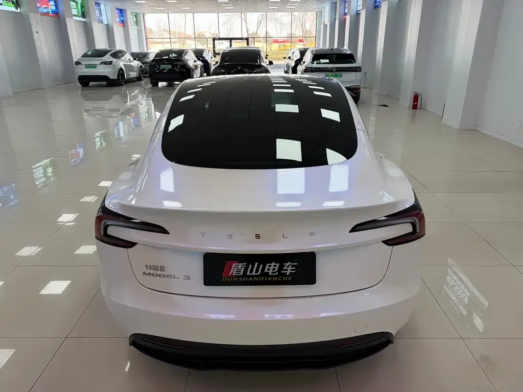 Tesla Model 3 — фото 5