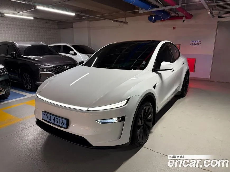 Tesla Model Y — фото 1