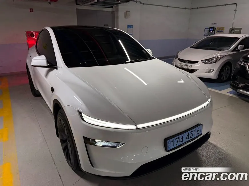 Tesla Model Y — фото 9