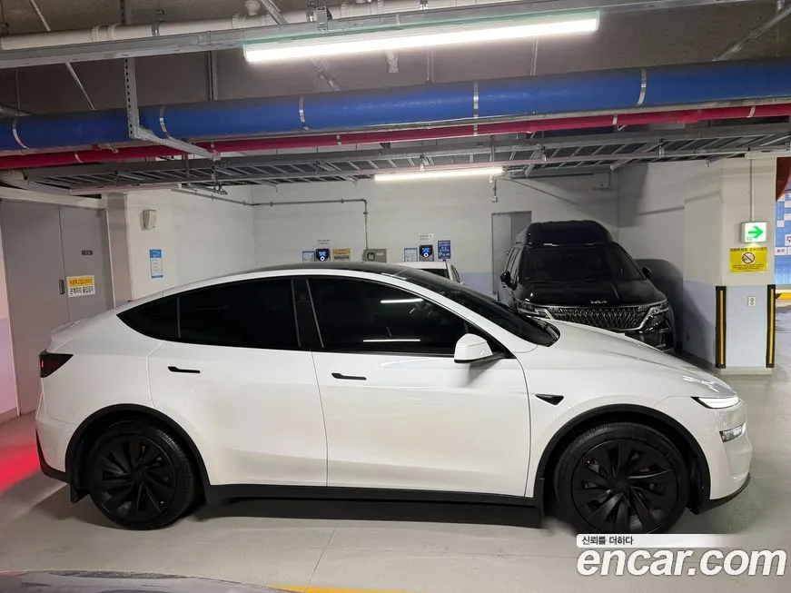 Tesla Model Y — фото 6