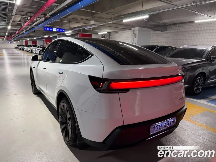Tesla Model Y — фото 4
