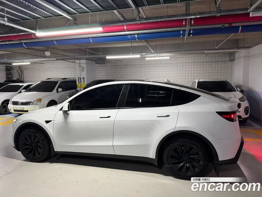 Tesla Model Y — фото 10