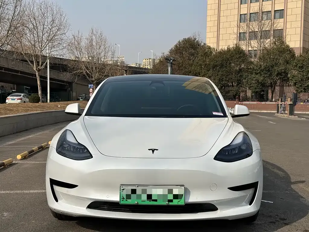 Tesla Model 3 — фото 7