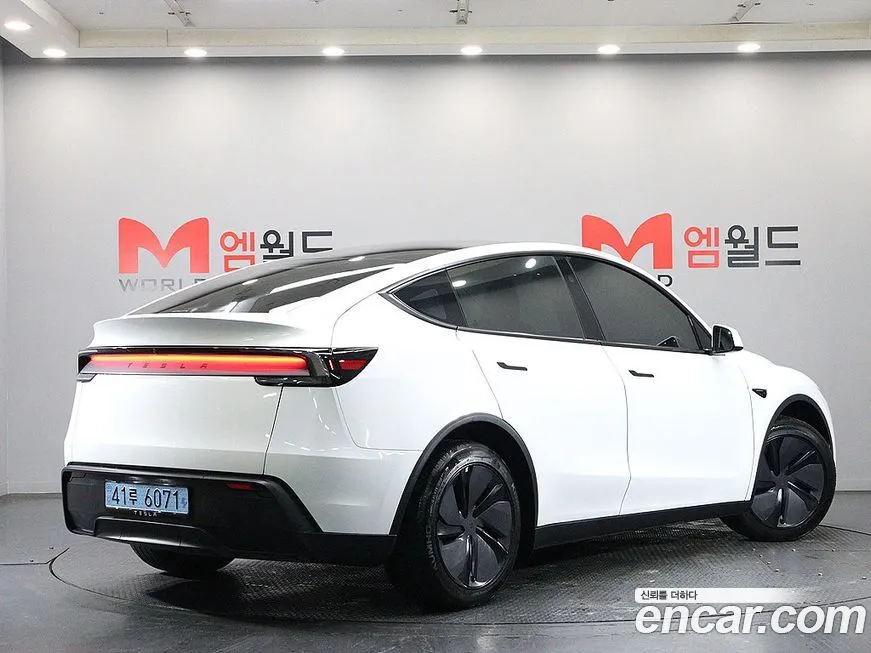 Tesla Model Y — фото 4