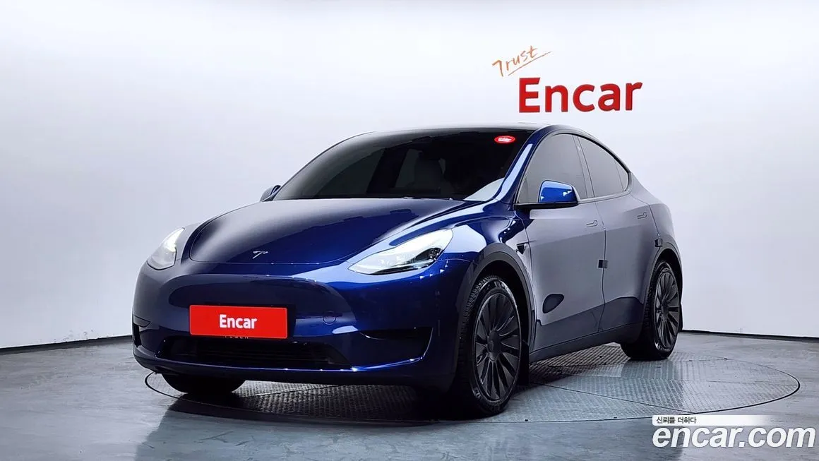Tesla Model Y — фото 1