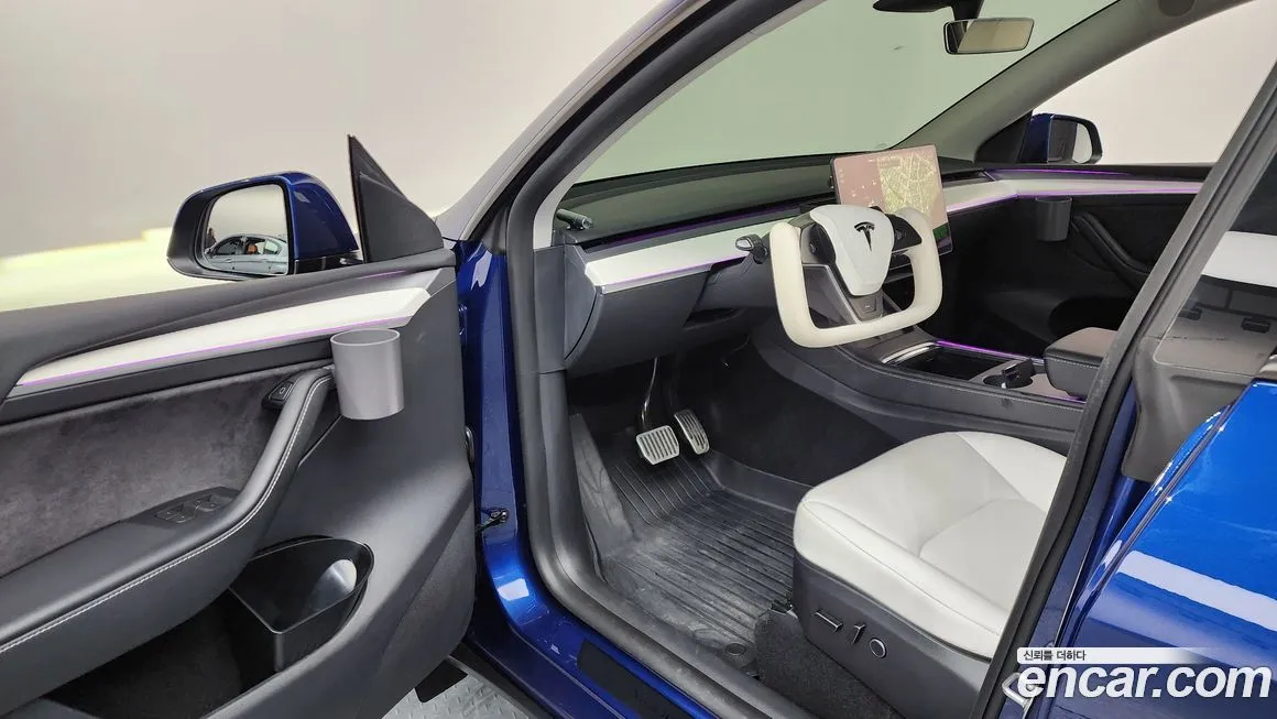Tesla Model Y — фото 10