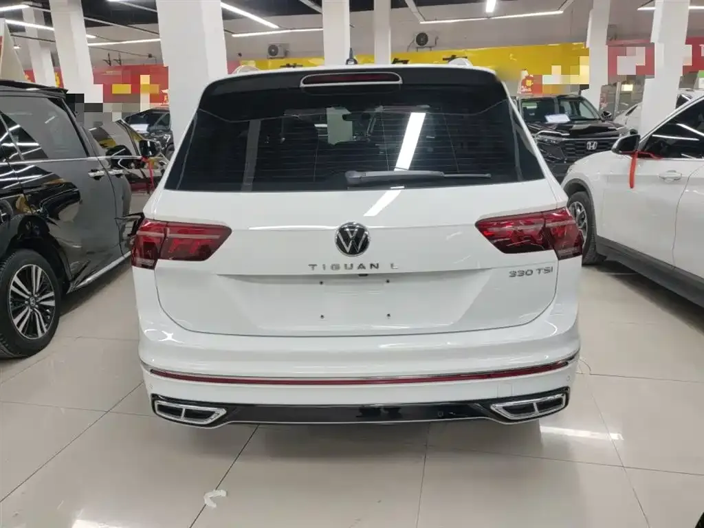 Volkswagen Tiguan L — фото 2