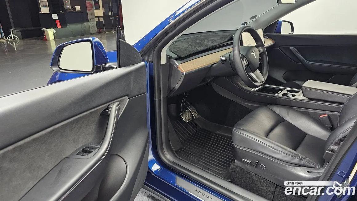 Tesla Model Y — фото 9