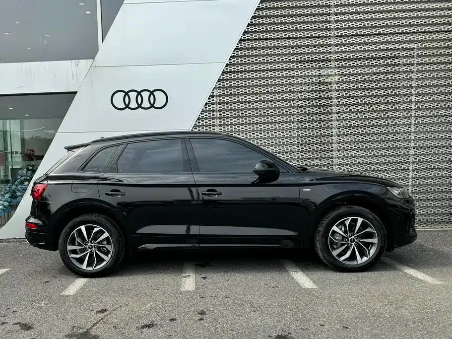 Audi Q5L — фото 6