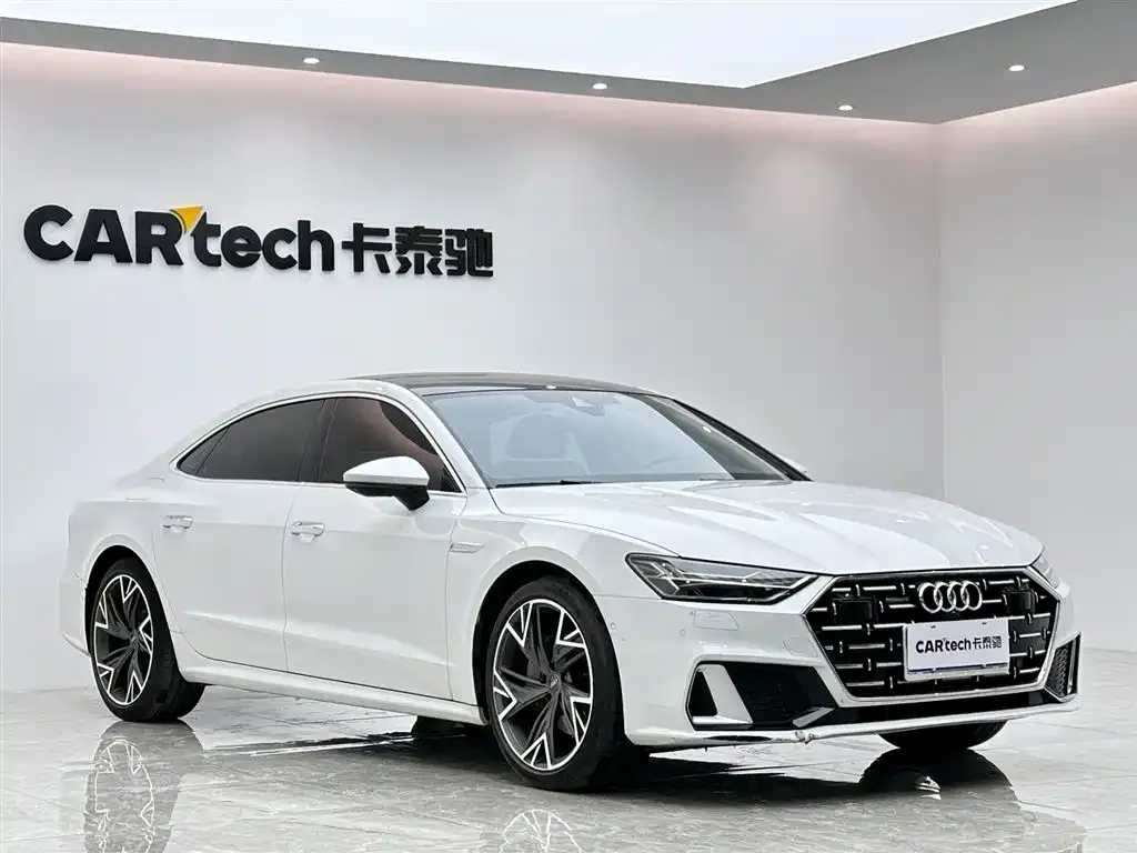 Audi A7L — фото 8