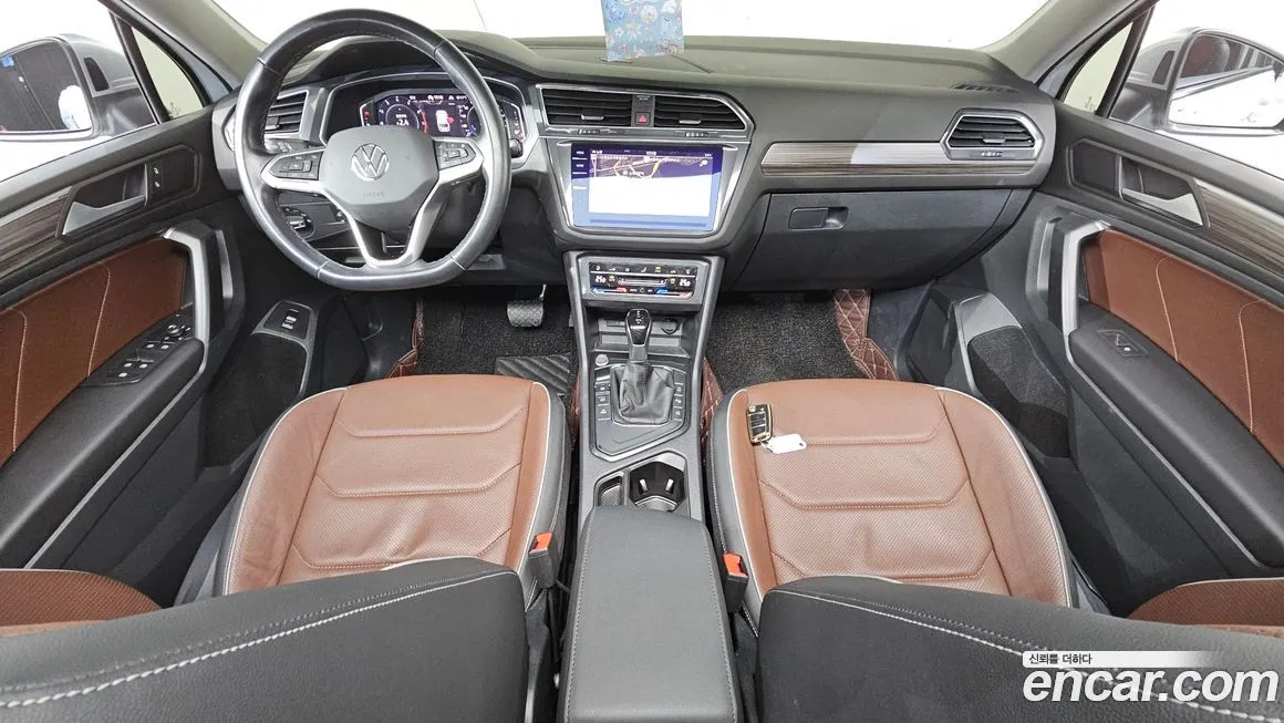 Volkswagen Tiguan — фото 10