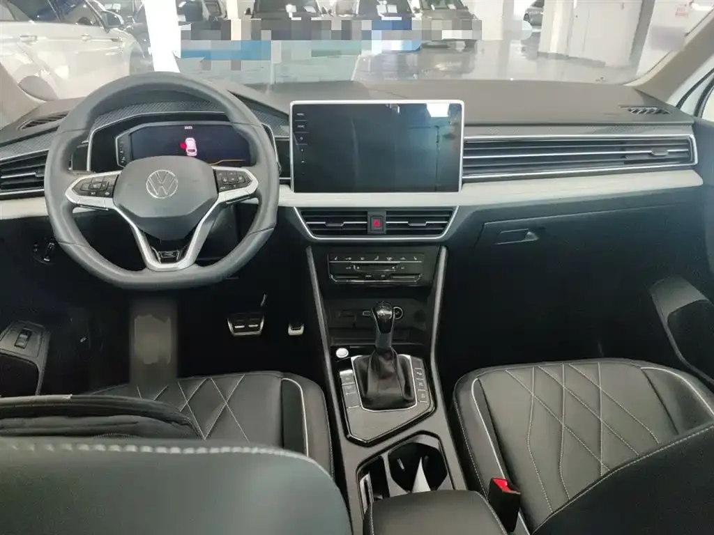 Volkswagen Tiguan L — фото 2