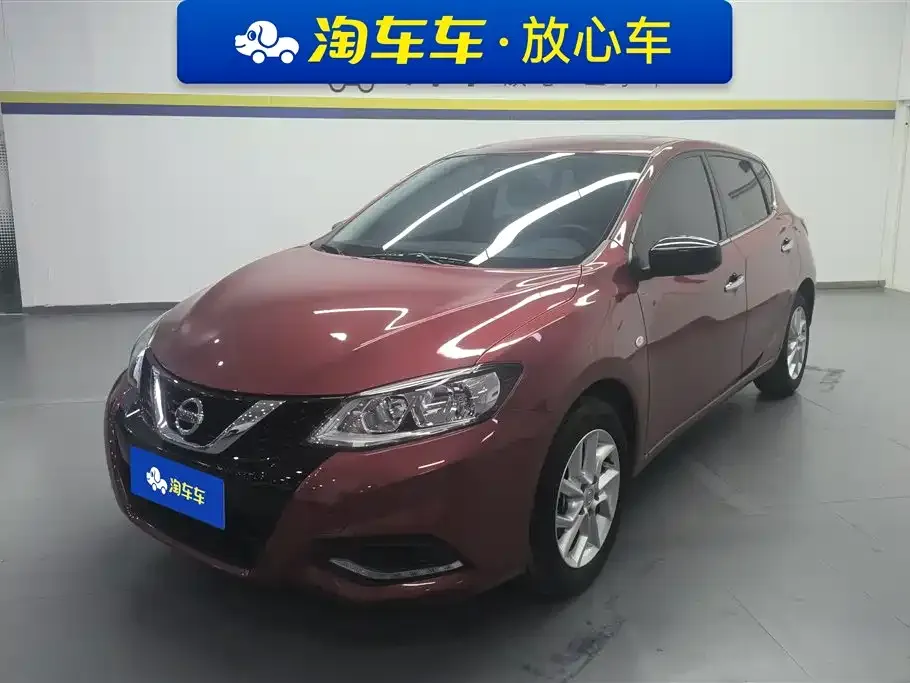 Nissan Tiida — фото 1