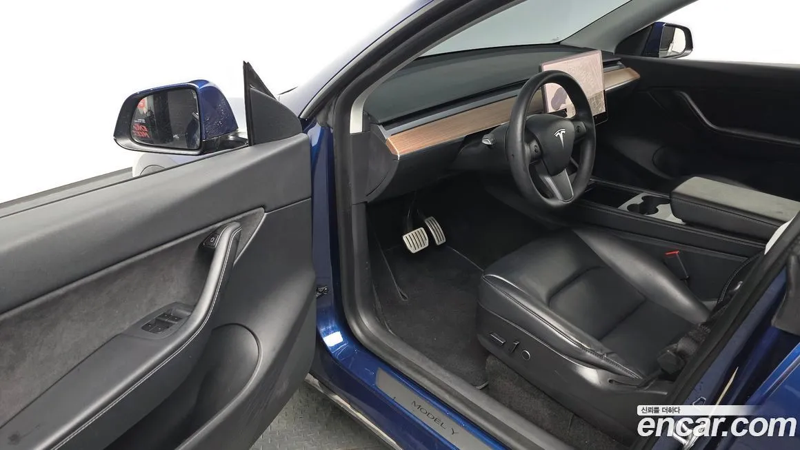 Tesla Model Y — фото 8