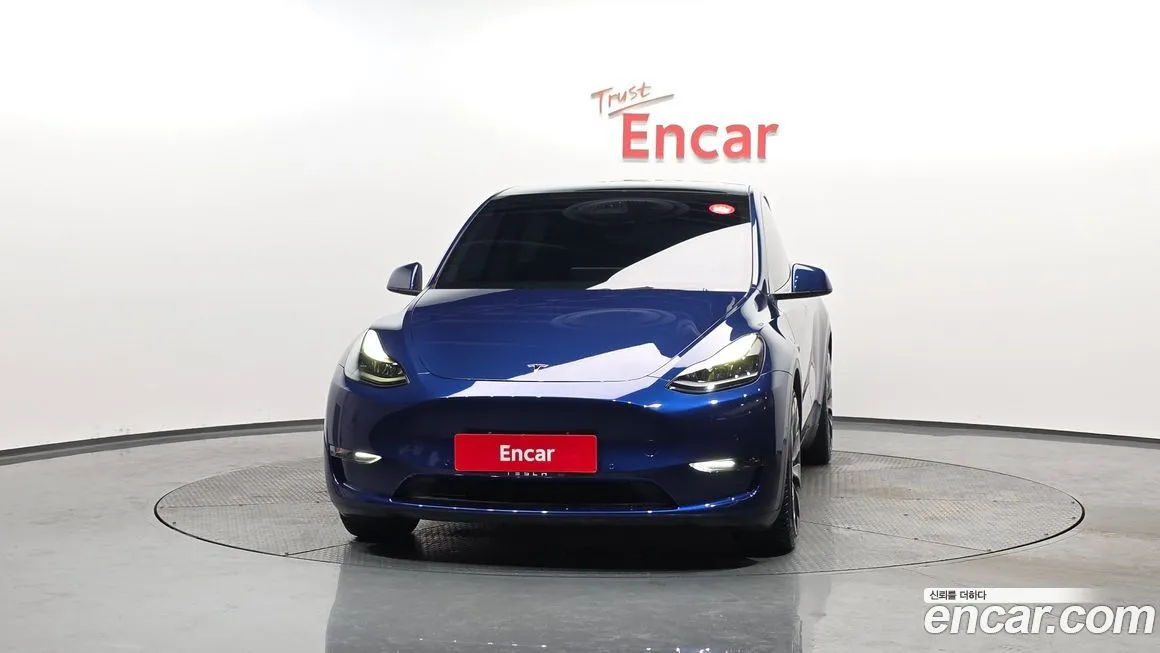 Tesla Model Y — фото 10