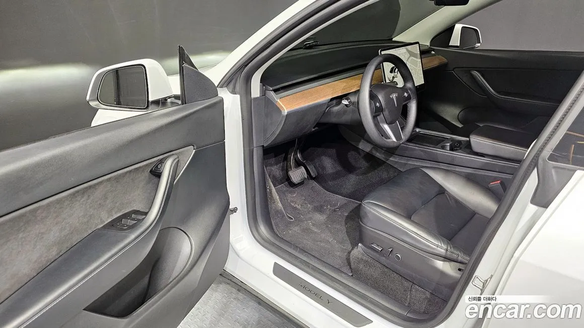 Tesla Model Y — фото 5