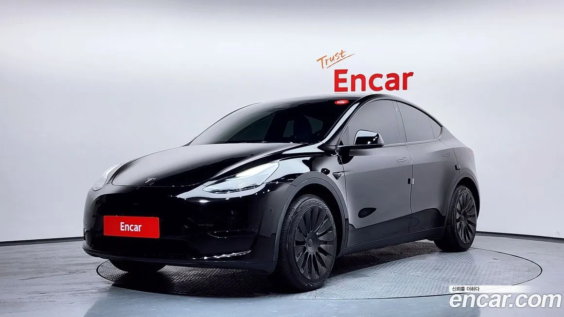 Tesla Model Y — фото 1
