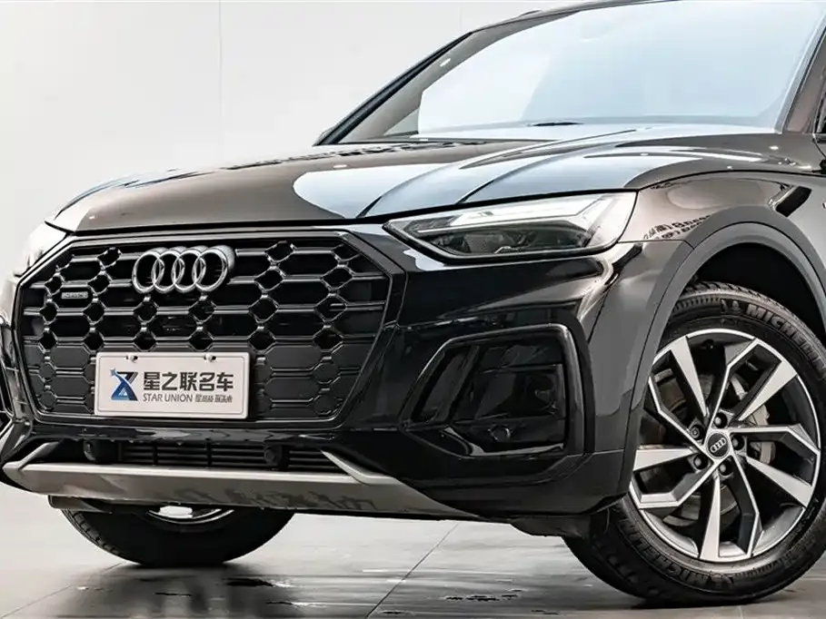 Audi Q5L — фото 10