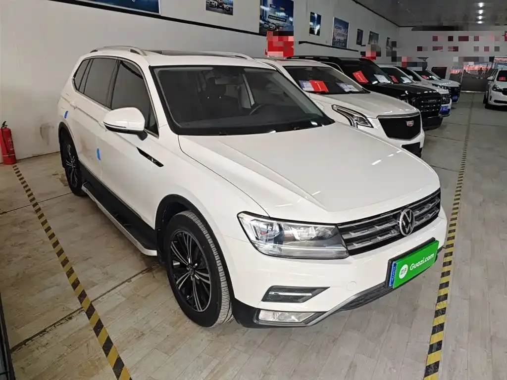 Volkswagen Tiguan L — фото 9