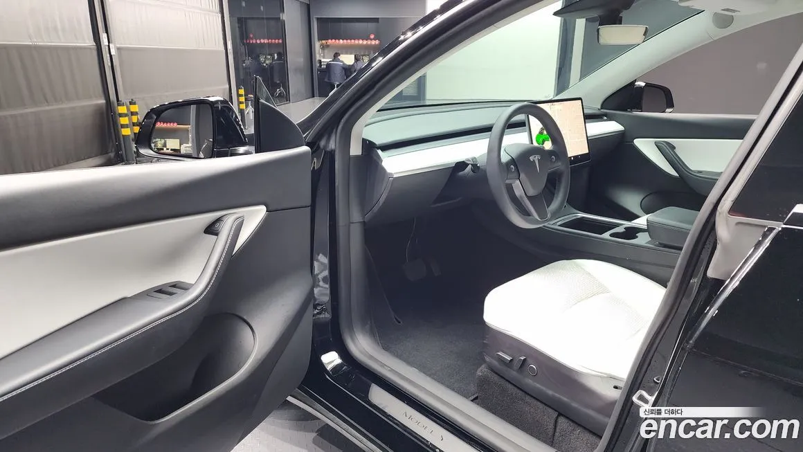 Tesla Model Y — фото 7