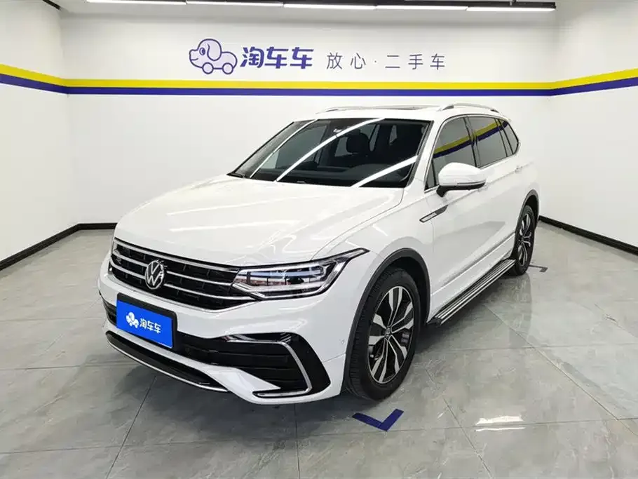 Volkswagen Tiguan L — фото 1