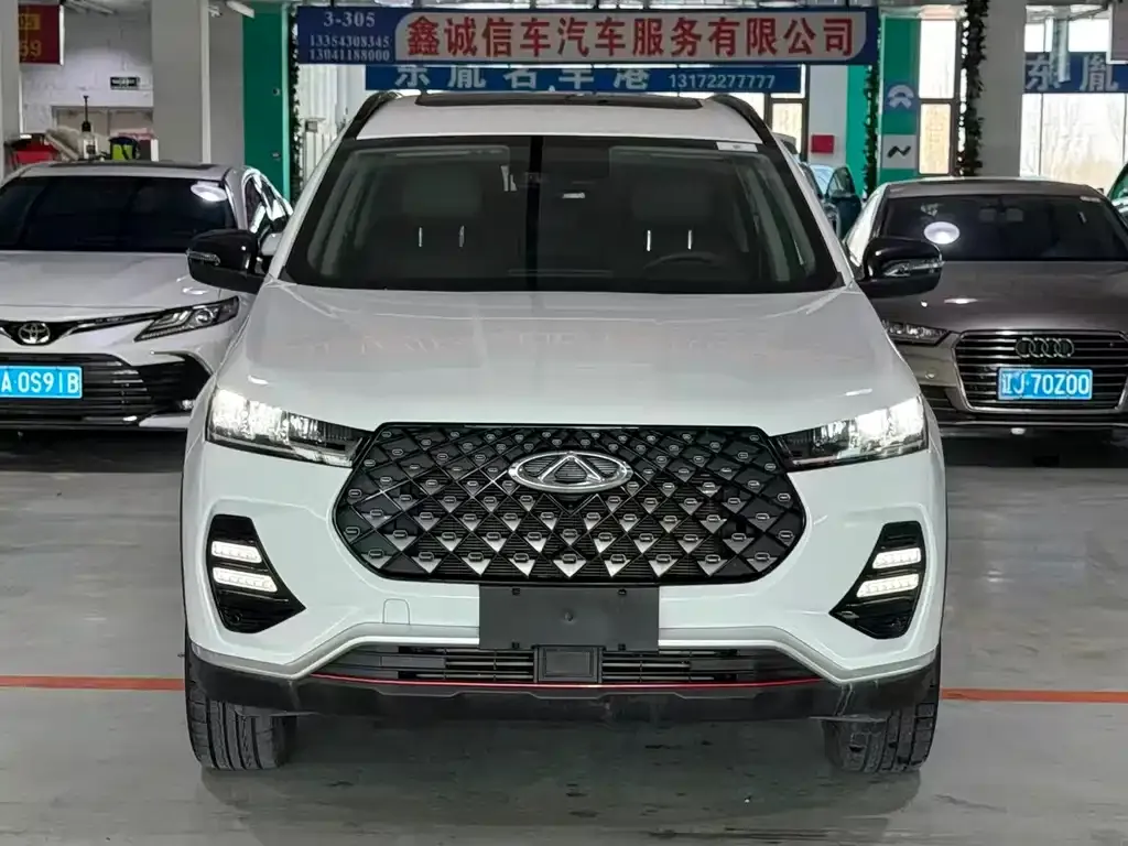 Chery Tiggo 7 — фото 8