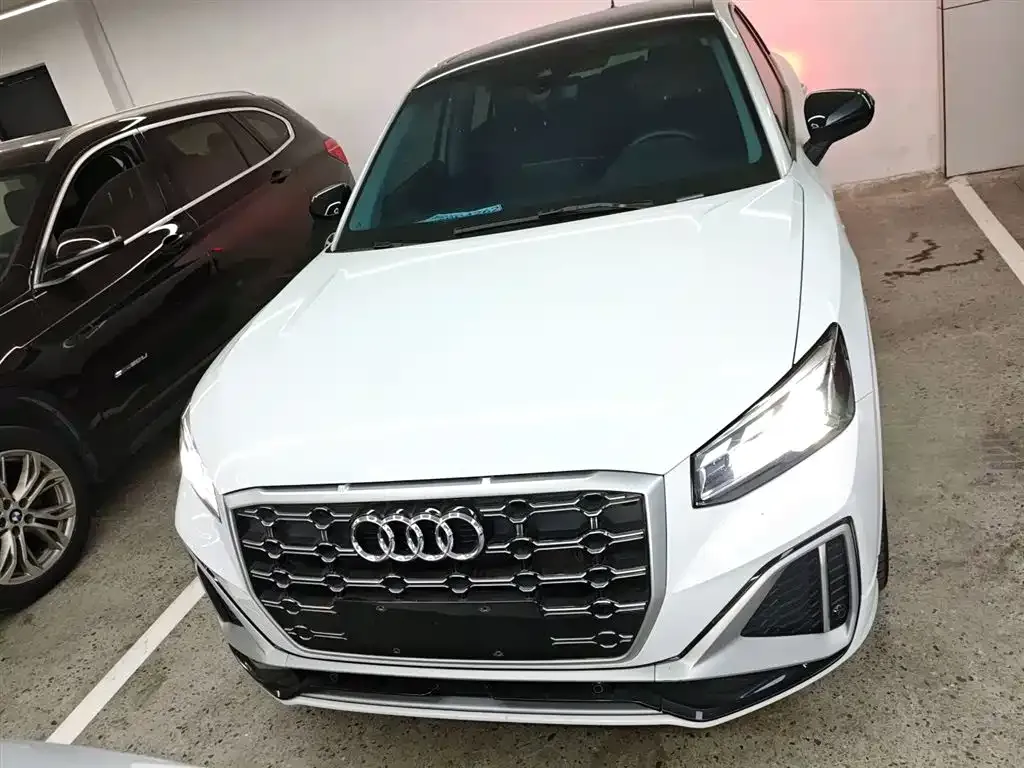 Audi Q2L — фото 6